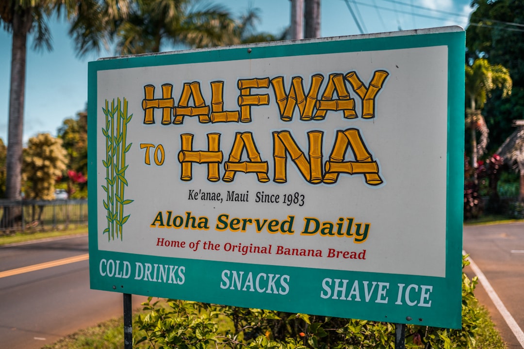 white and yellow signage during daytime / Photo by Jamaal Kareem on Unsplash