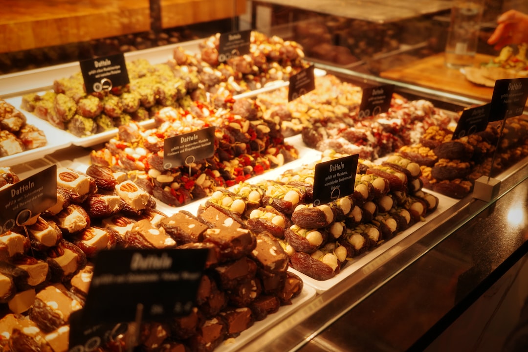 Assortment of chocolates and candies in a display case.