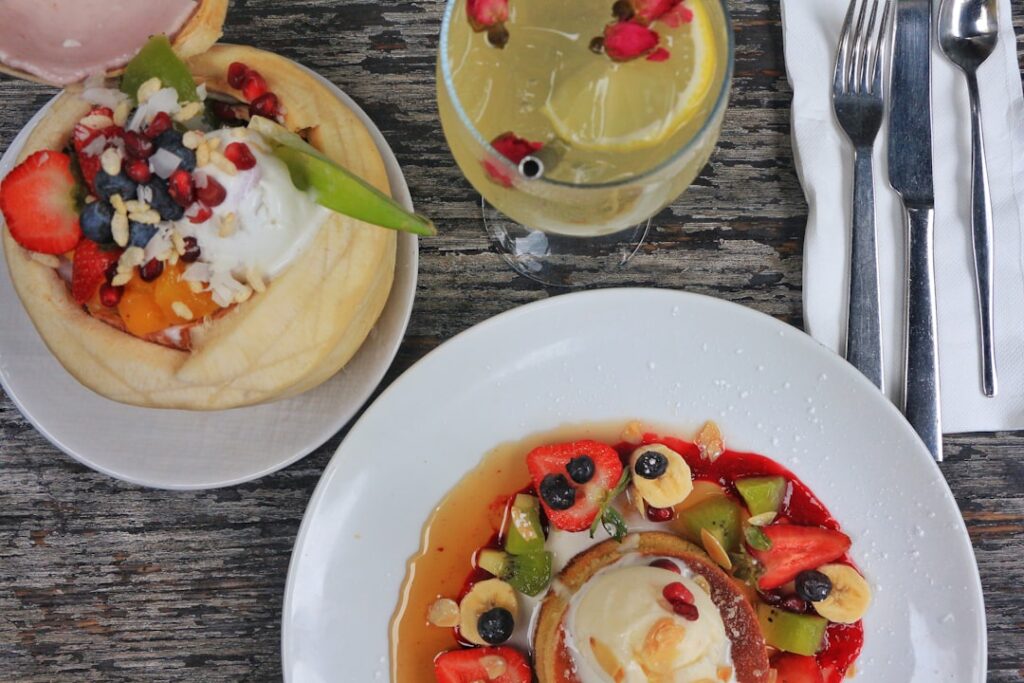 sliced fruits on white ceramic plate